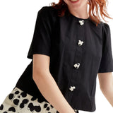 Compañía Fantástica - 61C11033 – Top negro 100% algodón con botones de corazones - Mujer