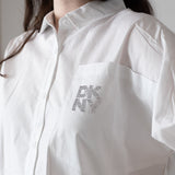 DKNY - D62567-10P – Camisa blanca de manga corta de popelín 100% algodón con pliegue en la espalda - Niña