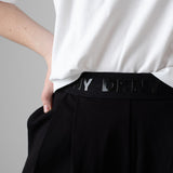 DKNY - D62574-09B – Pantalones cortos negros de tejido Milano con cintura elástica - Niña