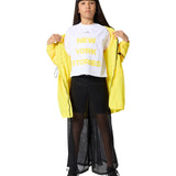DKNY - D62579-535 – Camiseta blanca de manga corta con estampado amarillo - Niña