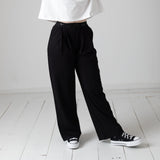 DKNY - D62583-09B – Pantalones negros de tejido Milano con cintura elástica y bolsillos - Niña