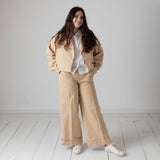 DKNY - D62608-20P – Trench 2 en 1 color arena de popelín arrugado con forro - Niña
