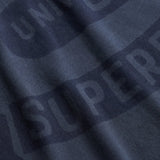Superdry - Athletic Tonal M1012430A-J6P - Camiseta azul de manga corta con estampado delantero - Hombre