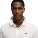 Superdry - M1110452A-01C – Polo clásico de piqué blanco de manga corta 100% algodón - Hombre