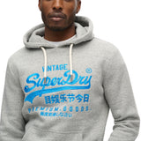 Superdry - M2013704A_ZUC - Sudadera gris tipo canguro con capucha y gráfico neón - Hombre