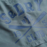 Superdry - M3010265A-9VC – Bañador azul de 40 cm. con logo impreso y forro de malla - Hombre