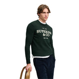 Superdry - M6110788A-20E - Jersey verde oscuro 100% algodón orgánico con gráfico aplicado - Hombre