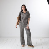System Action - V26CA361-40 – Camisa negra de manga corta con estampado geométrico - Mujer